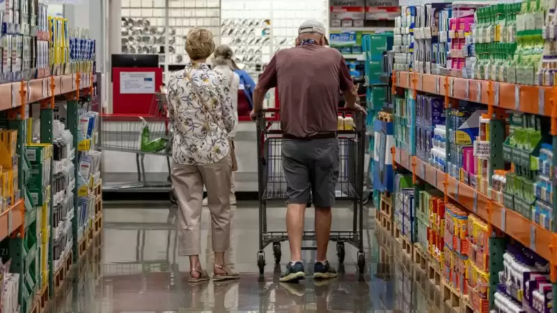 Consumer sentiment is back to near-record lows. But Americans are still spending.