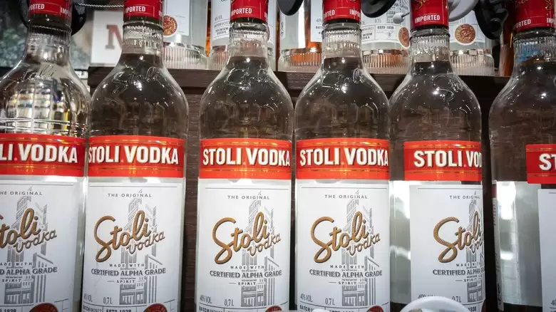 display of Stoli vodka on a retail store shelf